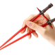 Illustration for article titled Kylo Ren Lightsaber Chopsticks Look Impossibly Uncomfortable To Hold